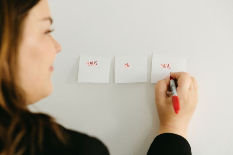 What is brand identity? Designer developing brand elements and visual direction for a cohesive business.